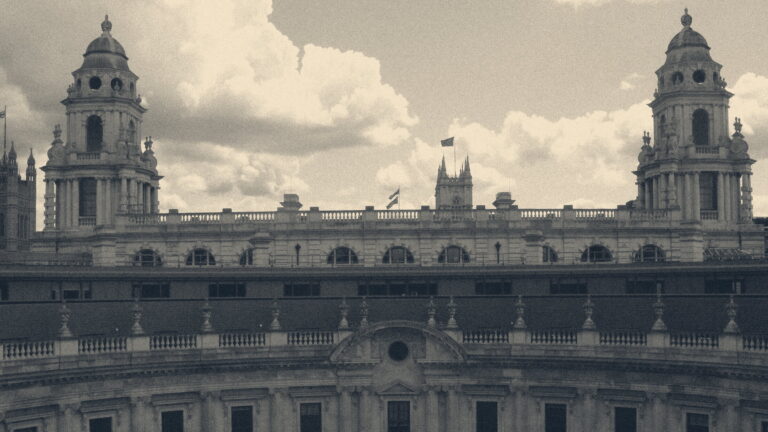 Neoclassical circular courtyard and baroque towers of 100 Parliament Street in London, housing HM Revenue & Customs.